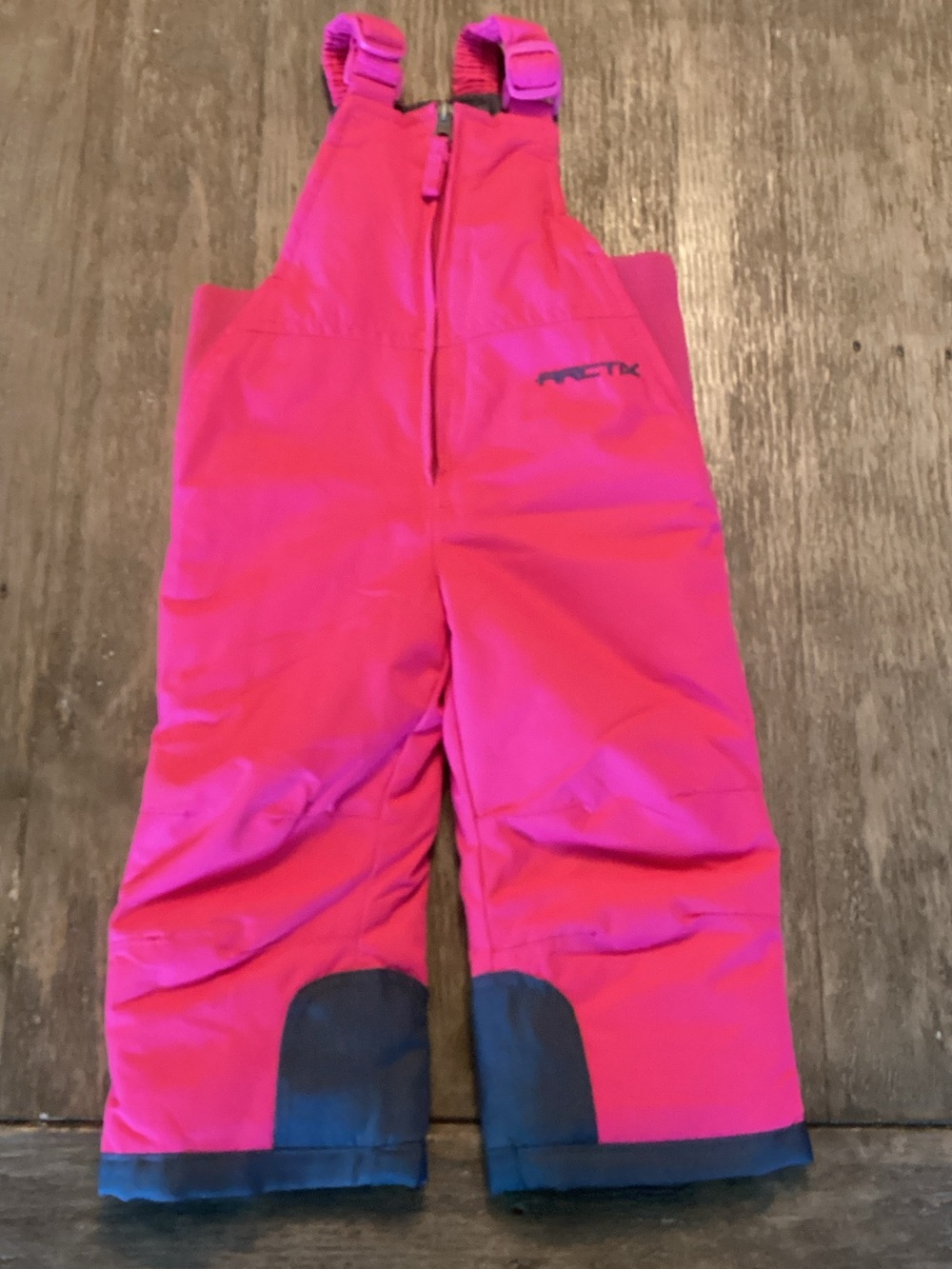 Arctix Hot Pink Kids Snow Bibs with Purple Strap Accents